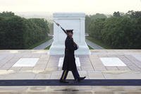 Army Sgt. 1st Class Andrew Jay patrols the Tomb of the Unknown Soldier at Arlington National Cemetery