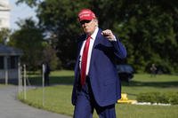 President Donald Trump walks on the South Lawn.