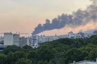 Smoke rises from the building of Iran's state-run television after an Israeli strike in Tehran, Iran.