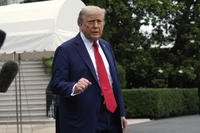 President Donald Trump walks to board Marine One after speaking with reporters