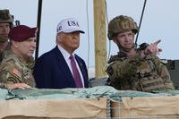President Donald Trump observes rocket launches at Fort Bragg