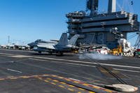 An F/A-18E Super Hornet, attached to Strike Fighter Squadron (VFA) 27, lands on the flight deck of Nimitz-class aircraft carrier USS George Washington (CVN 73) while underway in the Indian Ocean.