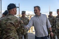 Army Secretary Dan Driscoll shakes hands with U.S. Army Chief Warrant Officer 2 Carlos Bustos, the second mate of USAV SSGT Robert T. Kuroda (LSV 7) assigned to 8th Special Troops Battalion, 8th Theater Sustainment Command, on July 21, 2025, at Joint Base Pearl Harbor-Hickam, Hawaii.