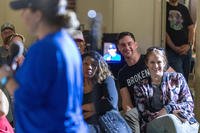 Recovering service members and caregivers take an evening break