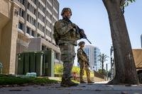 California National Guard members guard the Santa Ana Federal Building in Santa Ana after anti-ICE protesters protested and rioted outside U.S. federal buildings around the greater Los Angeles area.