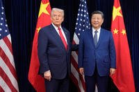 President Donald Trump, left, and Chinese President Xi Jinping pose ahead of their summit talk at Gimhae International Airport in Busan, South Korea, Thursday, Oct. 30, 2025. (AP Photo/Mark Schiefelbein)