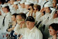 Pearl Harbor survivor Archie Odom salutes