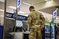A soldier visits a troop store on USAG Bavaria to make purchases at a self-checkout register. (Army &amp; Air Force Exchange Service Public Affairs)