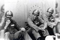 Lt. j.g. J. Robert Kerrey (center). (Photo: National Archives)