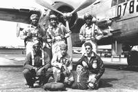 A Tuskegee Airman crew poses in front of a B-25. (Courtesy photo)