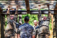 Basic cadets navigate the monkey bars on the obstacle course in the U.S. Air Force Academy's Jacks Valley during the field portion of their Basis Cadet Training July 22, 2015, in Colorado Springs, Colo. Liz Copan/U.S. Air Force