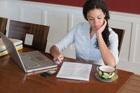 woman doing taxes