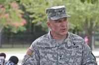 Army Maj. Gen. Stephen Lyons speaks during a news conference at the base in Fort Lee, Va., Monday, after a female soldier with a gun inside a key building at a Virginia Army base turned the weapon on herself. (AP Photo/Steve Helber)