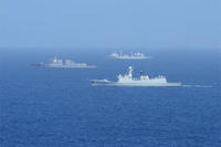 The USS Sterett transits alongside the Jiangkai II CNS Yun Chang and the Fuchi-class replenishment ship CNS Chao Hu during U.S.-China Counter-Piracy Exercise 15. (U.S. Navy photo by Mass Communication Specialist 3rd Class Eric Coffer)