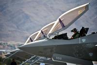 A fighter pilot conducts pre-flight checks inside an F-35A Lightning II before a training mission April 4, 2013, at Nellis Air Force Base, Nev. (U.S. Air Force/Senior Airman Brett Clashman)