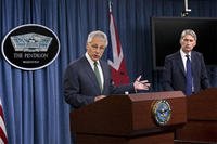 Defense Secretary Chuck Hagel, accompanied by British Defense Secretary Philip Hammond speaks during their joint news conference at the Pentagon, Thursday, May 2, 2013,. (AP Photo/J. Scott Applewhite)