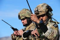 U.S. Air Force Tech. Sgt. Francisco Corona and Staff Sgt. David Dunn check the frequency on their radios during the Joint Terminal Attack Controller Advanced Instructor Course Jan. 28, 2013. (U.S. Air Force photo: Staff Sgt. William P. Coleman)