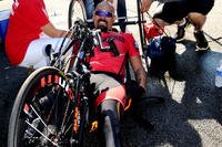 Medically retired Marine Corps Staff Sgt. Ronnie Jeffrey Jimenez celebrates after he earned a gold medal in the men's H5 hand cycle category at the 2015 DoD Warrior Games on Marine Corps Base Quantico, Va., June 21, 2015. DoD photo by Shannon Collins
