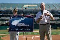 Secretary of the Navy Ray Mabus announces the name of the Independence-class littoral combat ship LCS 24 as USS Oakland during a major league baseball game. (U.S. Navy photo by Mass Communication Specialist 2nd Class Armando Gonzales/Released)