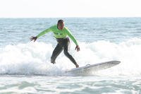 Marine Corps Master Sgt. Hugo L. Gonzalez surfs with Operation Amped at San Onofre Beach, Calif., Aug. 21, 2015. (U.S. Marine Corps photo by Cpl. Asia J. Sorenson)