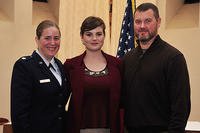 From left, U.S. Air Force Maj. Brittany Nutt, Kiersten Nutt and Steve Nutt after Kiersten enlisted in the Air Force, Nov. 23, 2015. (U.S. Air Force/A1C Larissa Greatwood)