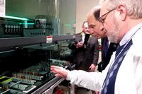 VA Secretary Bob McDonald watches a demonstration of blood samples being prepared for storage within a specialized refrigeration at the VA Medical Center in Boston. The samples will be part of a biorepository. (Photo by Bryant Jordan/Military.com)