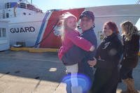 Petty Officer 1st Class Roger Sharp reunites with his family during the Dependable’s return to homeport in Virginia Beach, Va., Jan. 14, 2016.  (Photo: Senior Chief Petty Officer Sarah B. Foster)