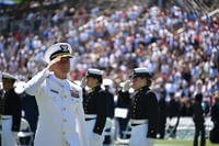 Coast Guard Commandant Adm. Paul Zukunft departs the stage following the 136th Coast Guard Academy commencement exercise in New London, Conn., May 17, 2017. (Coast Guard photo/Petty Officer 2nd Class Patrick Kelley)