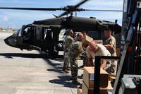 Citizen-Soldiers from the Puerto Rico National Guard Army Aviation Support Facility distributed water and food to the community of Orocovis, Sept. 29, 2017. (Photo by Sgt. José Ahiram Díaz-Ramos, PRNG-PAO)