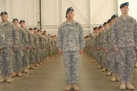 Soldiers of the 1st Combat Arms Battalion 16th Infantry Regiment, 1st Brigade, 1st Infantry Division, halt movement during the 1st CAB, 16th Inf. Reg. award ceremony held at Ft. Riley, January 31, 2012. (Army Photo by Staff Sgt. Robert DeDeaux)