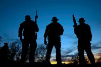 FILE Photo -- Navy SEALs conduct training in a remote area. (U.S. Navy Photo/Mass Communication Specialist 2nd Class Martin L. Carey)