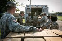 Soldiers from the 36th Engineer Brigade from Fort Hood load boxes of Meals-Ready-to-Eat into an Red Cross Emergency Response Vehicle in support of relief operations for Hurricane Harvey victims in Beaumont, Texas, Sep. 1. (U.S. Army/ Spc. Liem Huynh)