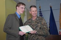 Steve Sanford receiving the DSC from Gen. Peter Pace.