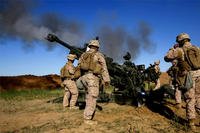 FIRE BASE BELL, Iraq -- U.S. Marines fire an M777A2 Howitzer at an ISIS infiltration route on March 18. (US Marine Corps photo)