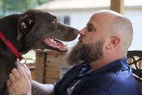 Merrick, rescue dog becomes service dog to Army veteran Mclean Raybon