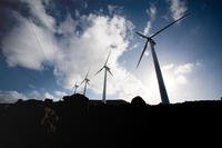 Four 225-kilowatt wind turbines help produce power for Ascension Auxiliary Airfield, a small base belonging to the 45th Space Wing. (U.S. Air Force photo/Lance Cheung)
