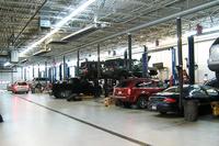Car dealership garage (Wikipedia photo by Christopher Ziemnowicz)