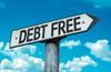 A road sign points to "debt free"