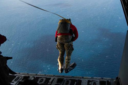 U.S. Air Force pararescueman jumps out of a MC-130J