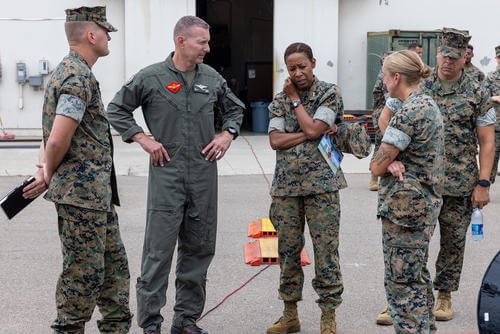 U.S. Marine Corps Maj. Gen. Michael Borgschulte, middle left, and Maj. Gen. Lorna Mahlock, middle right, engage with Marines with Marine Air Control Group 38, 3rd MAW, on Marine Corps Air Station Miramar, California.