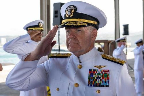 Adm. Samuel Paparo, commander, U.S. Pacific Fleet, salutes sideboys during the COMPACFLT change of command ceremony onboard Joint Base Pearl Harbor-Hickam.