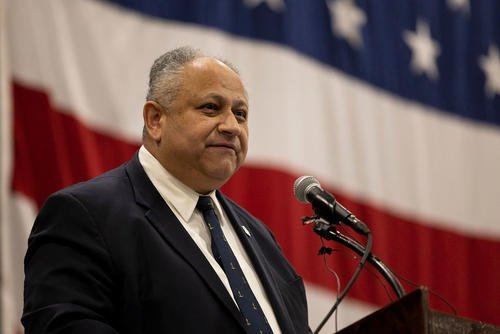 Secretary of the Navy Carlos Del Toro speaks on stage