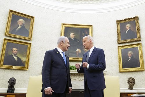 President Joe Biden talks with Israeli Prime Minister Benjamin Netanyahu