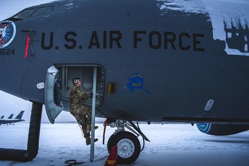 Air National Guard Senior Airman Tyler Winterton, crew chief with the 168th Wing, Eielson Air Force Base, Alaska, prepares a KC-135 Stratotanker prior to mission.