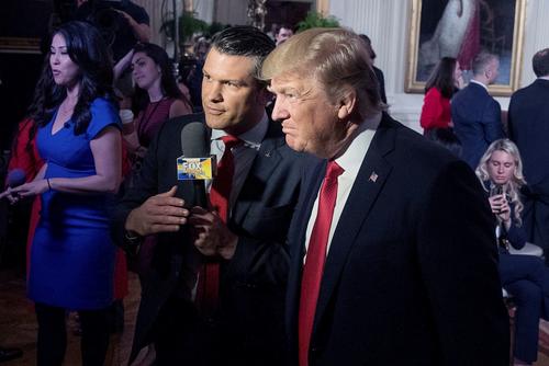 President Donald Trump, right, appears on &quot;Fox &amp; Friends&quot; with co-host Pete Hegseth