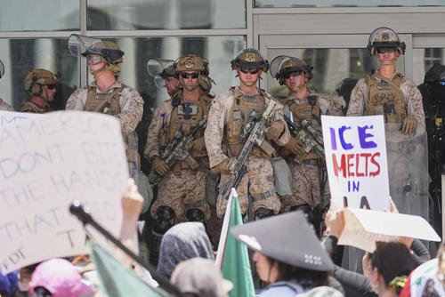 U.S. Marines guard a federal building in Los Angeles