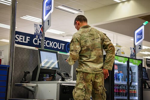 A soldier visits a troop store on USAG Bavaria to make purchases at a self-checkout register. (Army &amp; Air Force Exchange Service Public Affairs)